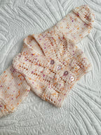 0-3 peachy fleck hand knit