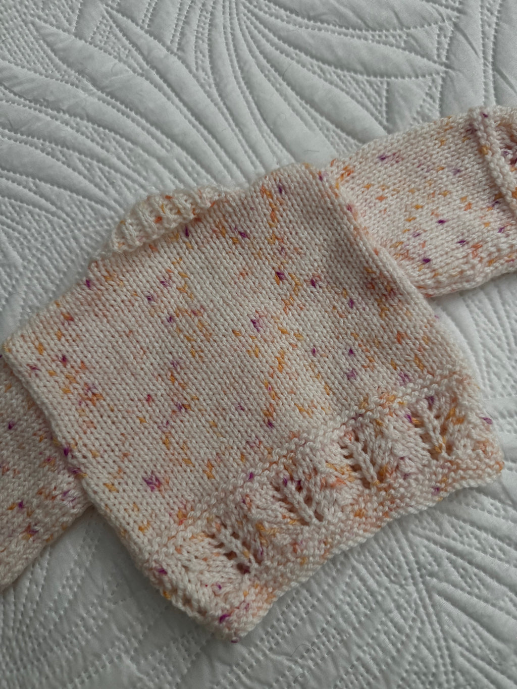 0-3 peachy fleck hand knit