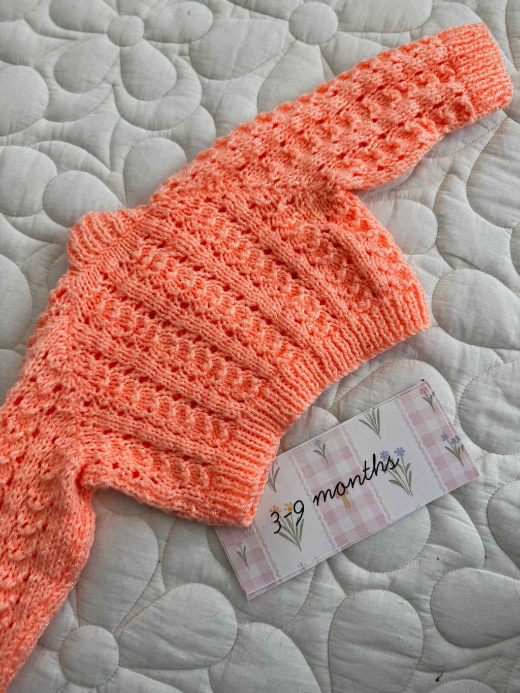 3-6/6-9 orange glitter hand knit