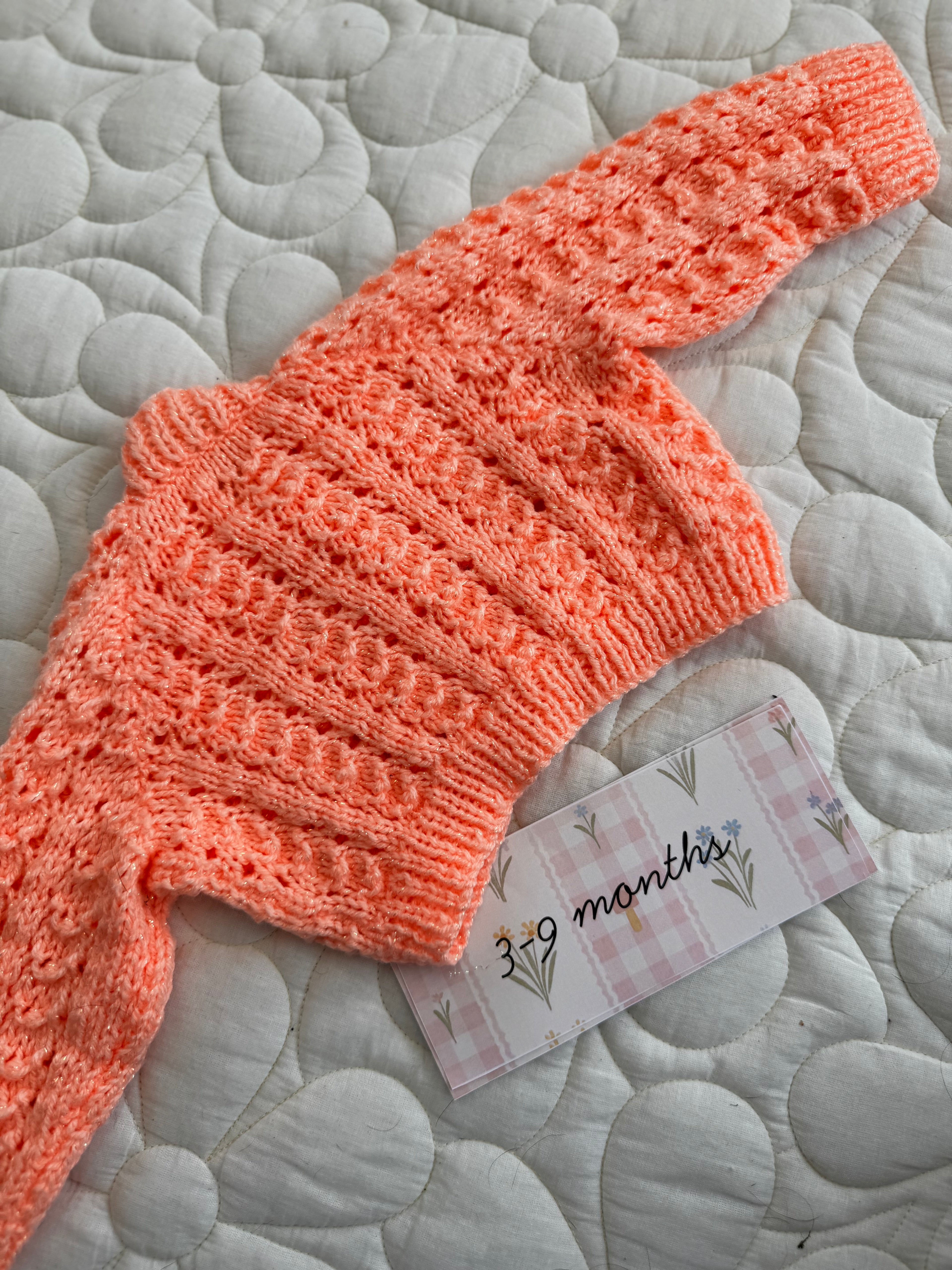 3-6/6-9 orange glitter hand knit