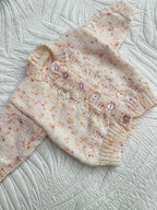 0-6 peachy fleck hand knit