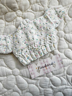 Newborn speckled multicoloured hand knit