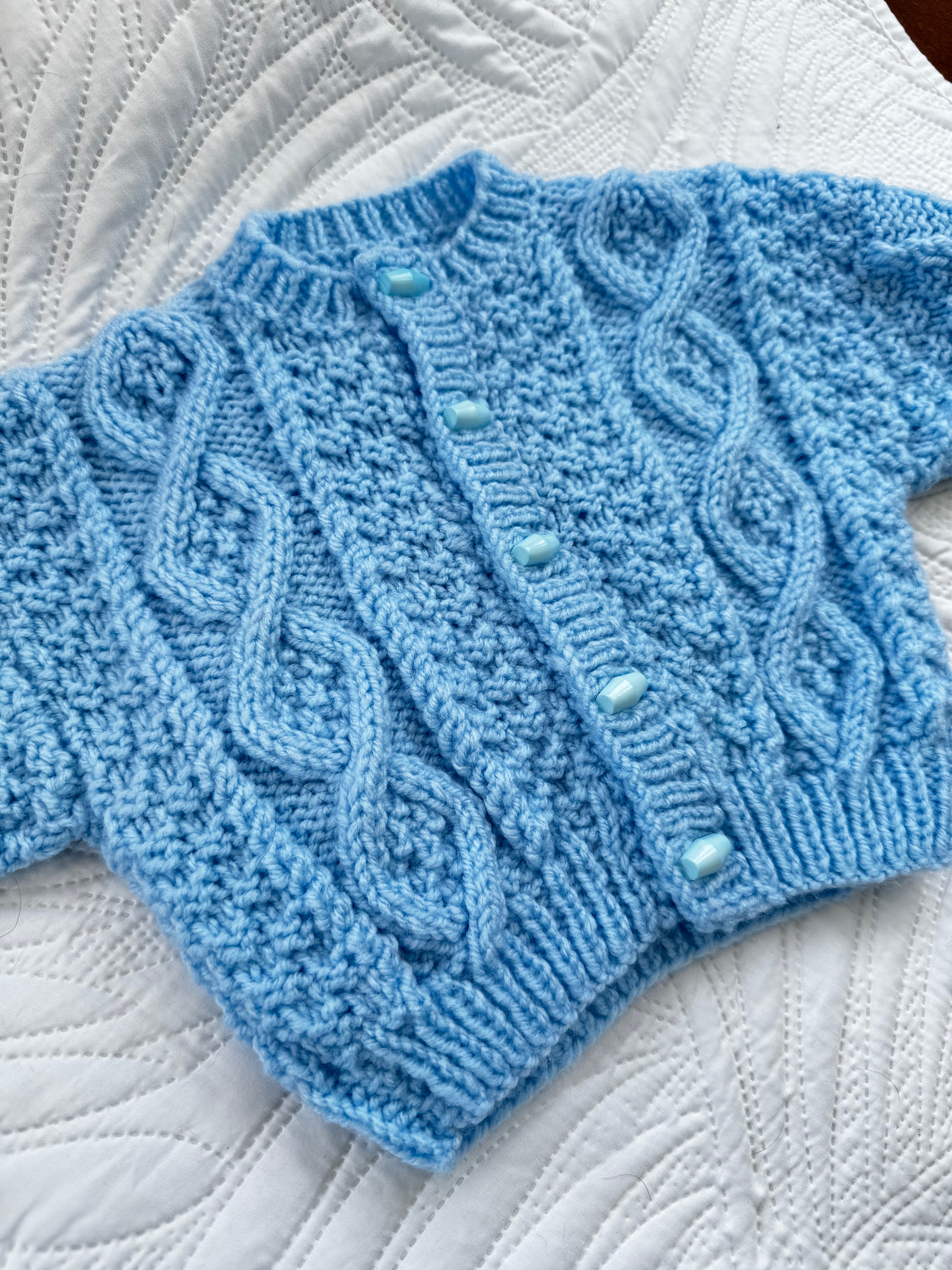 6-12 (+) blue Aran cardi