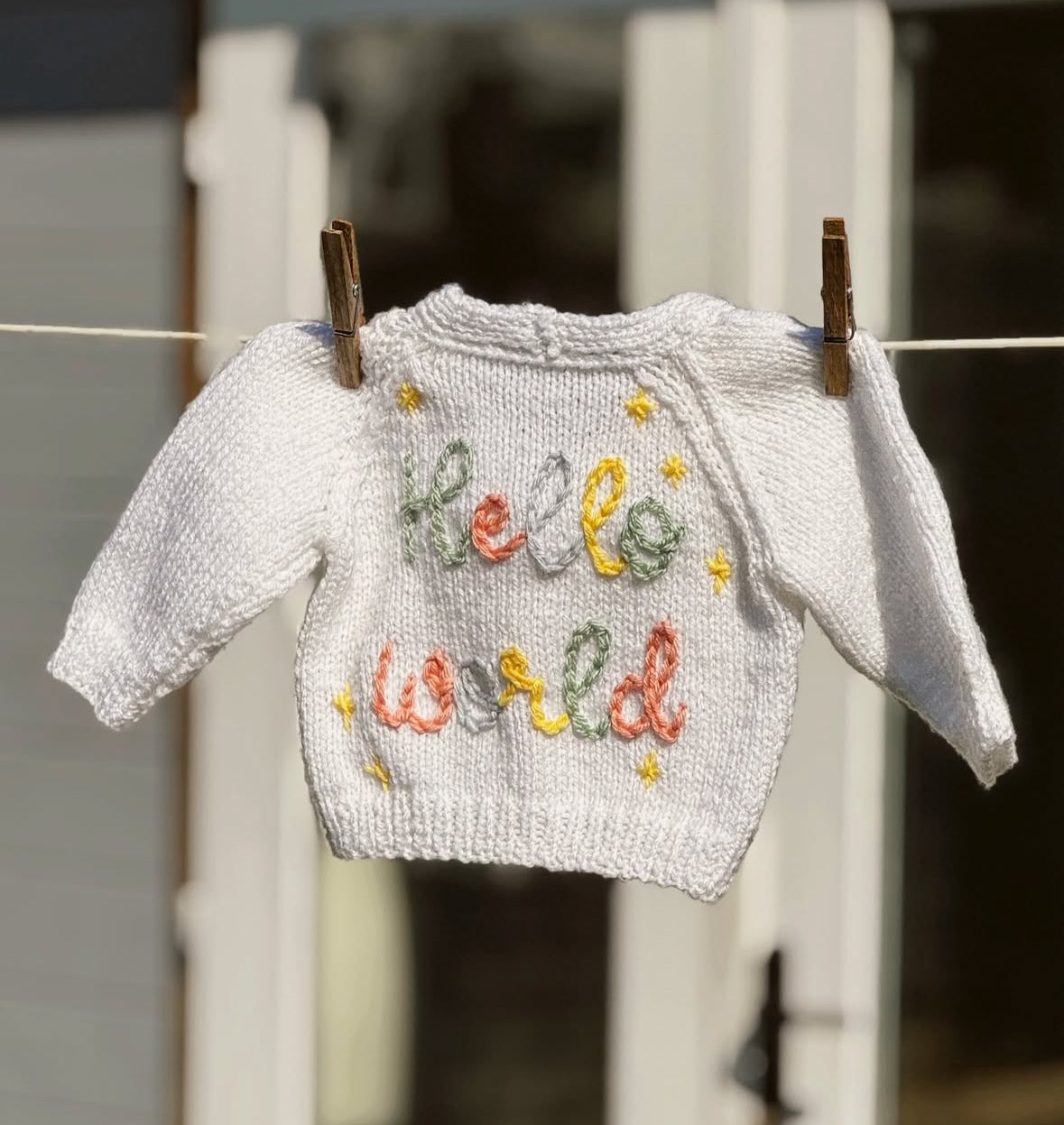 Hello World newborn cardi