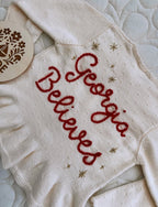 ‘Believes’ cardigan
