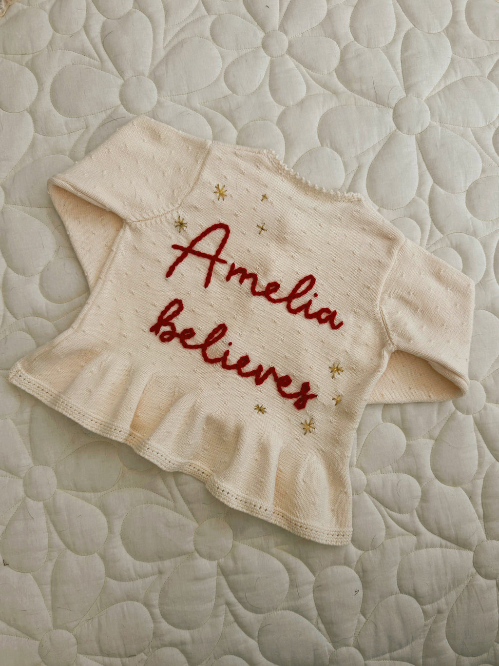 ‘Believes’ cardigan