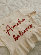 ‘Believes’ cardigan